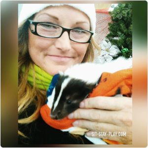 baby skunk and Kelley Stewart